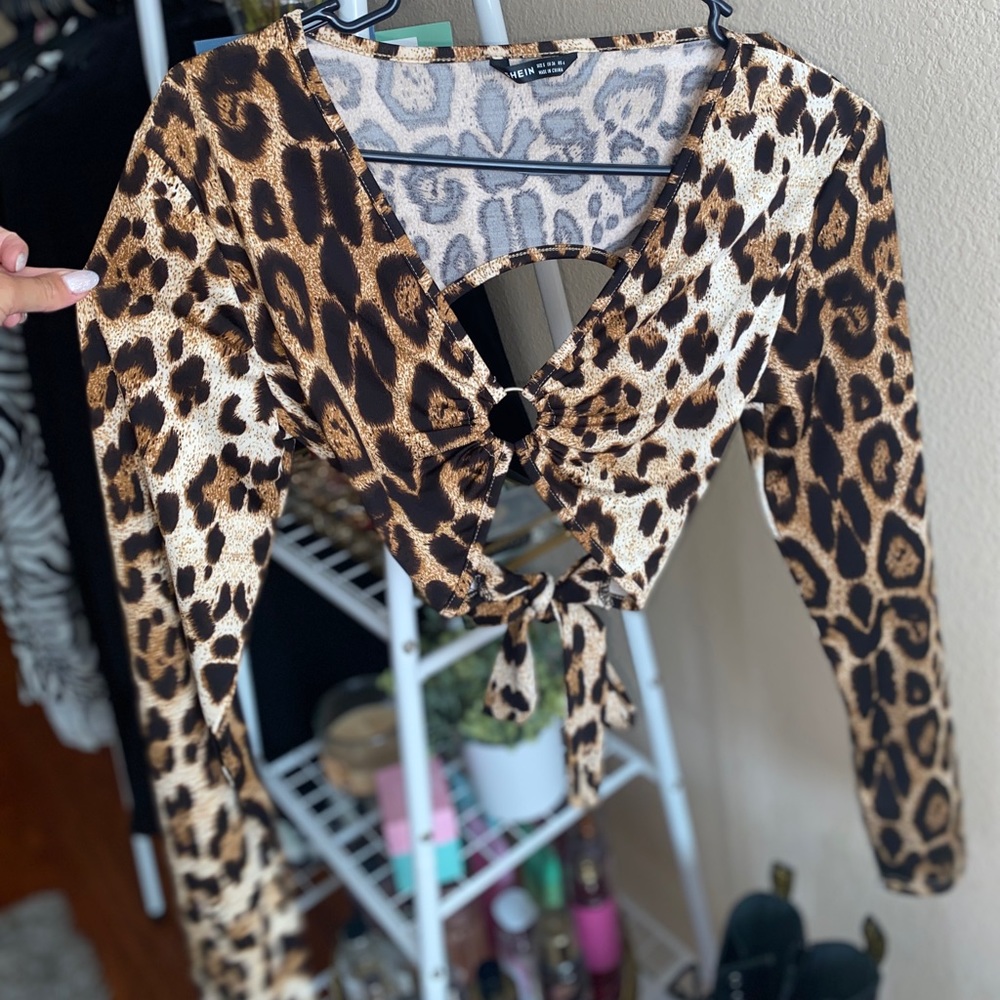 cut-out animal print long sleeve crop top.